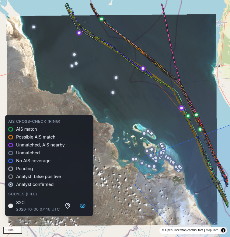 A map of the southern Red Sea off Assab, Eritrea, with a square Sentinel-2 scene of 6 October 2026 laid over the basemap: the Eritrean coast and desert on the left, open water in the middle, the Yemeni shore at the top right. Coloured AIS tracks run down a shipping lane from the top of the scene to its south-east corner. Green AIS match rings sit on those tracks, purple Unmatched, AIS nearby rings lie beside them, and grey Unmatched rings dot the open water and cluster among the islands and shallows south-east of the coast. A magnified legend lists the ring colours: AIS match, Possible AIS match, Unmatched, AIS nearby, Unmatched, No AIS coverage, Pending, Analyst: false positive and Analyst confirmed, then the scene, S2C, 2026-10-06 07:46 UTC.